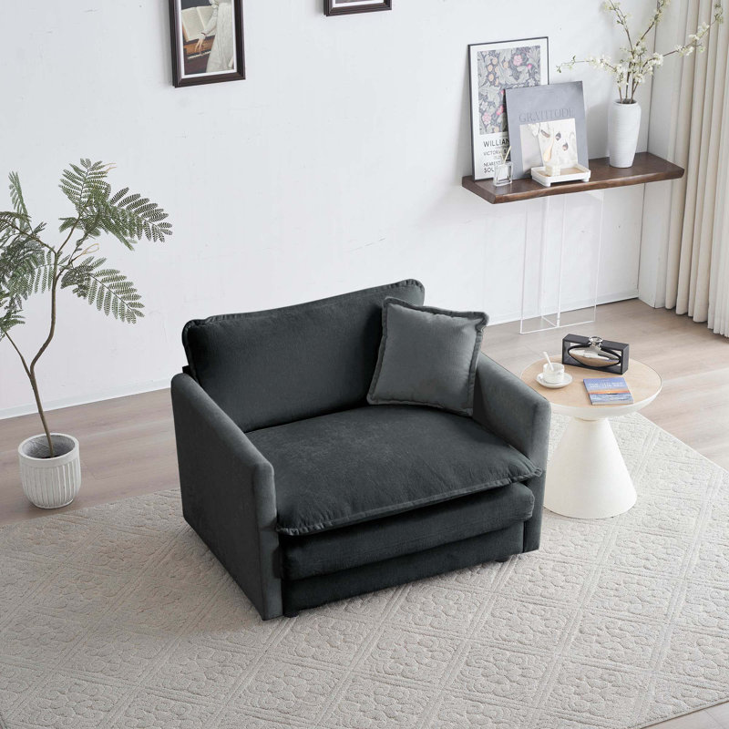 Fauteuil confortable pour le salon avec coussin moelleux, idéal pour la détente
