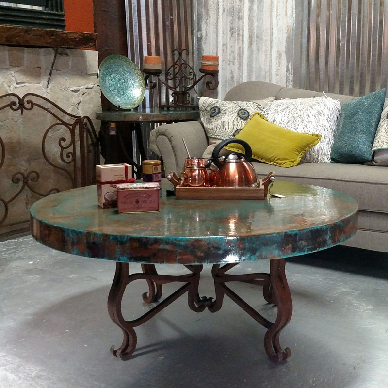 Luxurious Wrought Iron Coffee Table embellished with a 48” Round Oxidized Copper Top