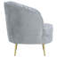 Chaise en velours gris avec pieds dorés, détails décoratifs élégants et sièges confortables