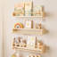 Ensemble de 3 étagères murales flottantes en bois naturel pour livres, jouets et articles de décoration. Idéales pour la chambre, le salon ou l'entrée.