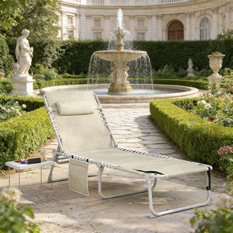 Chaise longue pliante avec trou pour la pelouse