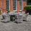 Andrenique 6 - Person Patio Dining Set with Round Table