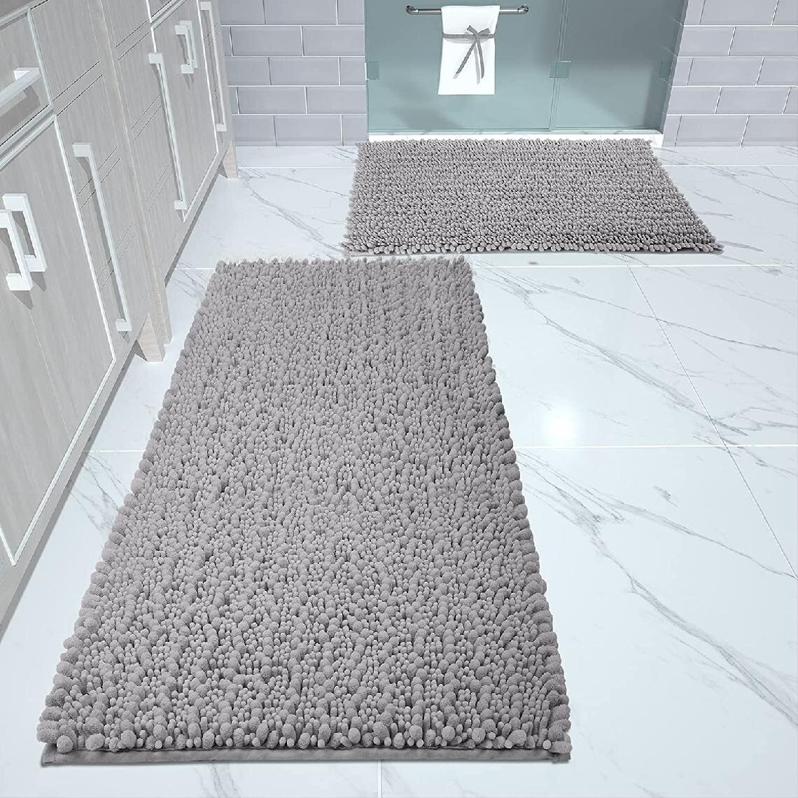 https://assets.wfcdn.com/im/71328080/compr-r85/1657/165737913/gambill-microfiber-bath-rug-with-non-slip-backing.jpg