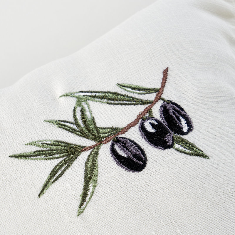 Housse de coussin olive brodée