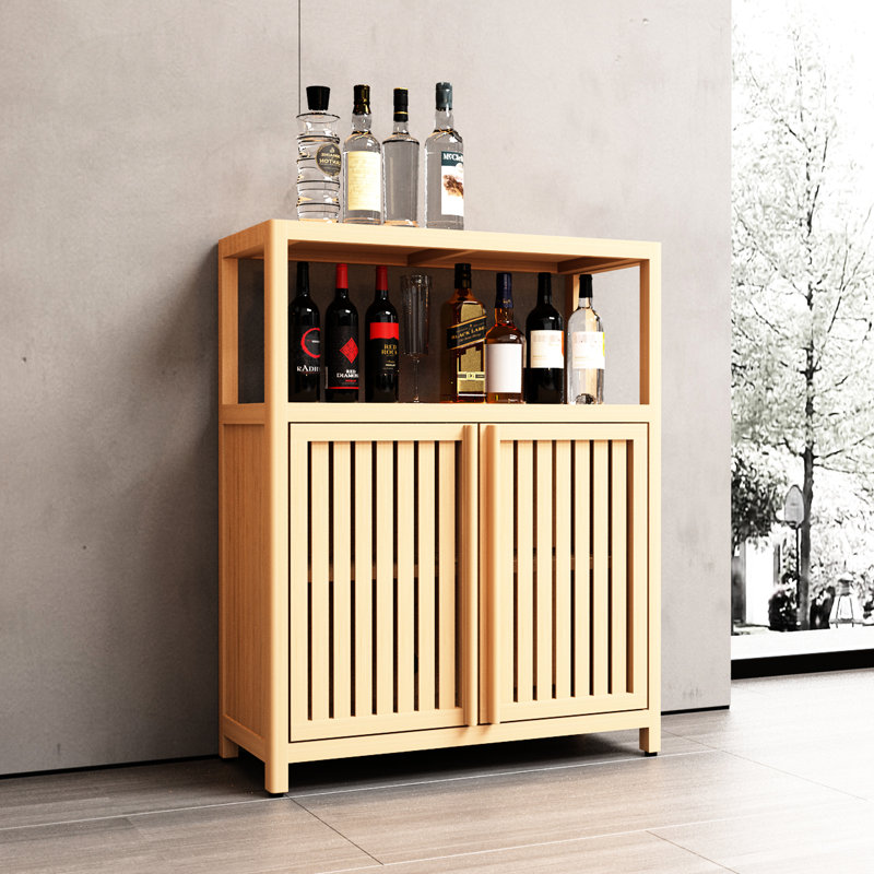 Rangement à grande capacité - pour la salle de bain et le salon, cette armoire à 2 portes à persiennes maximise l'espace dans les tablettes