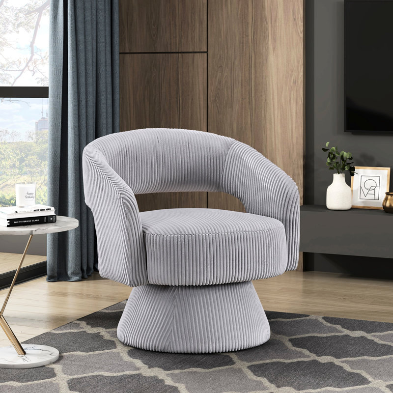 Fauteuil pivotant de luxe en gris, revêtement en velours côtelé, structure en bois massif, ajoute de la sophistication à la chaise luxueuse de l'espace de vie, gris