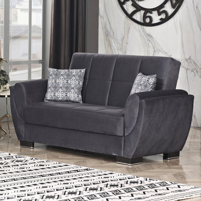 Microfibre grise avec rangement et fonction convertible. Idéal pour les petits espaces. Fabriqué en Turquie. Capacité de charge de 600 lb. Coussins de siège. Assemblage sans effort. Nettoyer les taches