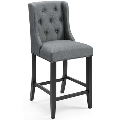Tabouret capitonné en tissu Baronet