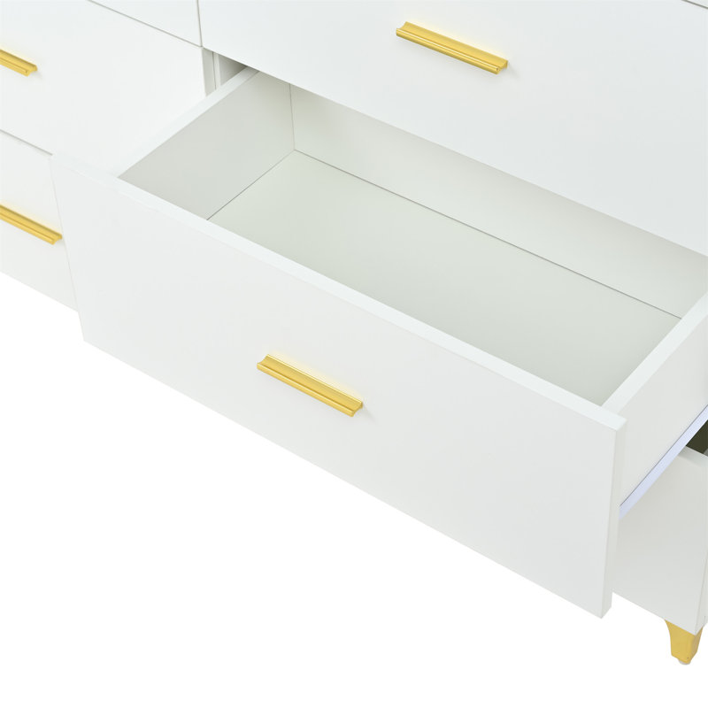 Commode 6 tiroirs blanche avec poignées dorées et pieds en métal