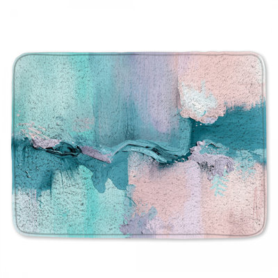 Tapis de bain bleu et rose