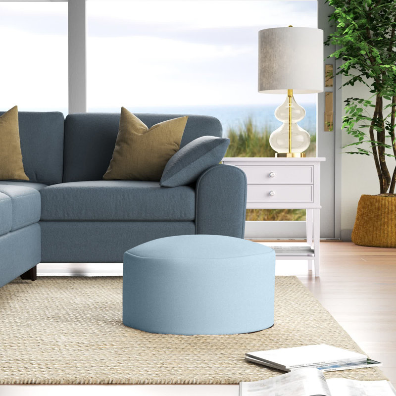 Repose-pieds repose-pieds rond de couleur unie en mélange de polyester 22" Damion, Brise