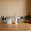 Table de salle à manger décorative avec plateau en bois et base en magnésium blanc