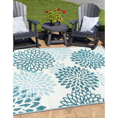 Ramveer Floral Blue/Ivory Reversible Indoor/Outdoor Plastic Straw Area Rug