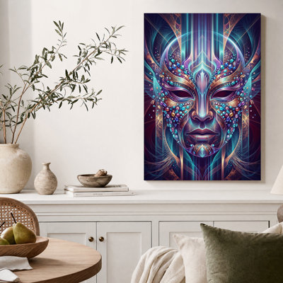 Tableau sur toile représentant un masque lumineux symétrique aux accents turquoise et or