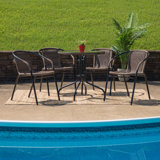 28'' Round Glass Table with Rattan Edging and 4 Rattan Stack Chairs