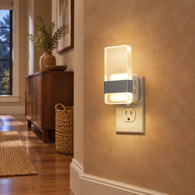 Acrylic wall-plug LED night lamp set of 2 combines dusk-to-dawn decorative lighting with adjustable 0-100LM dimming for bathrooms, hallways, and kitchens.