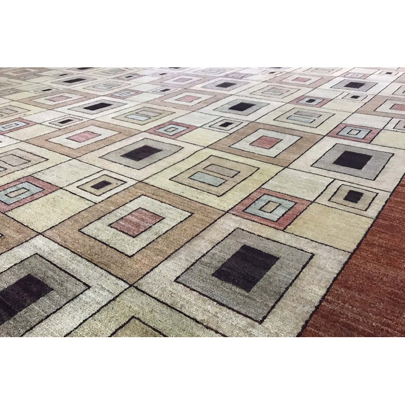 Tapis beige et rouge noué à la main de haute qualité