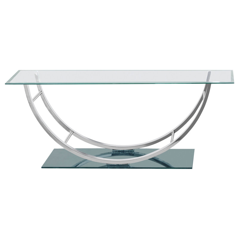 Table basse élégante en U avec plateau en verre avec finition chromée réfléchissante pour les espaces de vie modernes