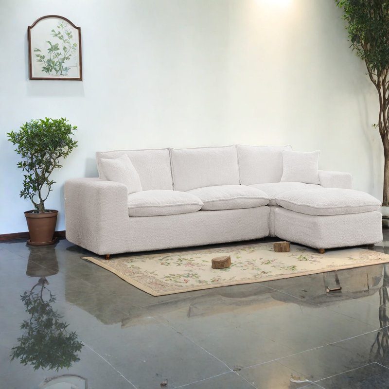 Canapé modulaire confortable avec repose-pieds Boucle