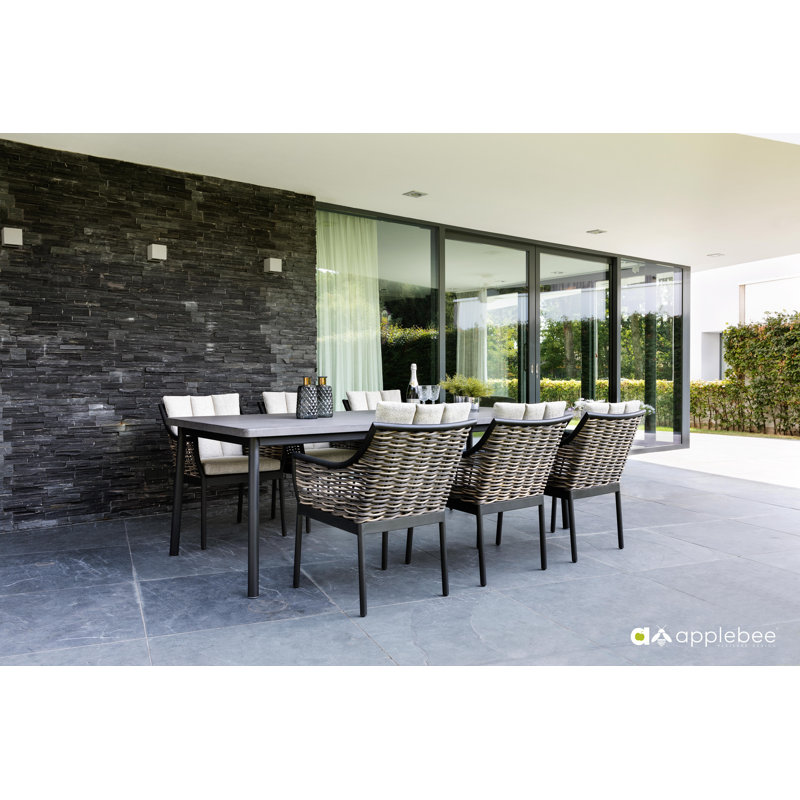 Tarunjot 6 - Person Premium All-Weather Wicker Patio Dining Set with Rectangular Table , Cushions Included