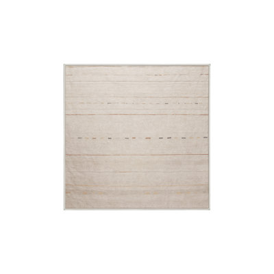 Tapis beige lavable à la machine