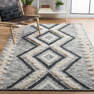 Adamary Hand Loomed Wool/Cotton Southwestern Rug in Ivory/Black