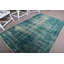 Tapis turc à motif rétro vert idéal pour décorer le salon