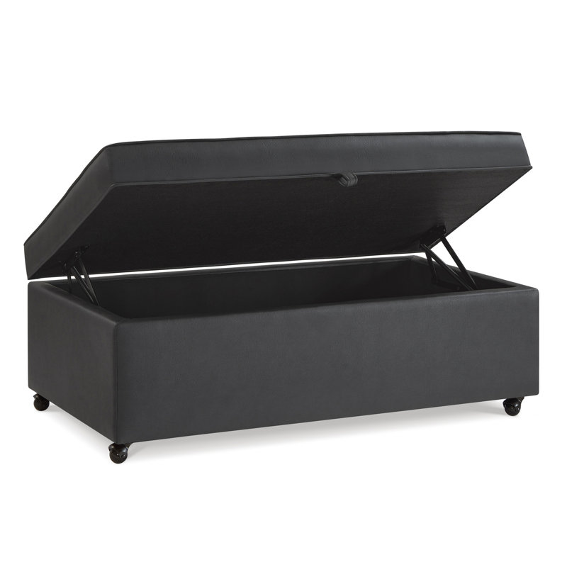 Banc gris foncé avec possibilité de rotation à 360 degrés et fonction de table basse