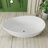 63" Egg-Shaped Wavy Curves Solid Surface Bathtub, Freestanding Seamless Deep Soak Tub with Drain & Overflow – Spa Sanctuary for Luxury Bathrooms-101056273