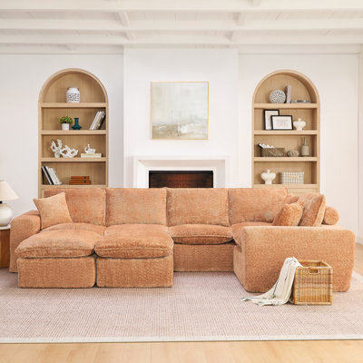 Spacieux canapé modulaire moderne avec repose-pieds et repose-pieds Boucle