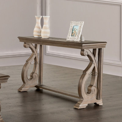 Table de canapé de style traditionnel avec structure en bois massif et pieds courbés à volutes avec finition sculptée en chêne vieilli