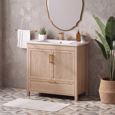 Meuble-lavabo simple 36 po avec plateau en résine, panneaux de bois cannelés et rangement à fermeture en douceur