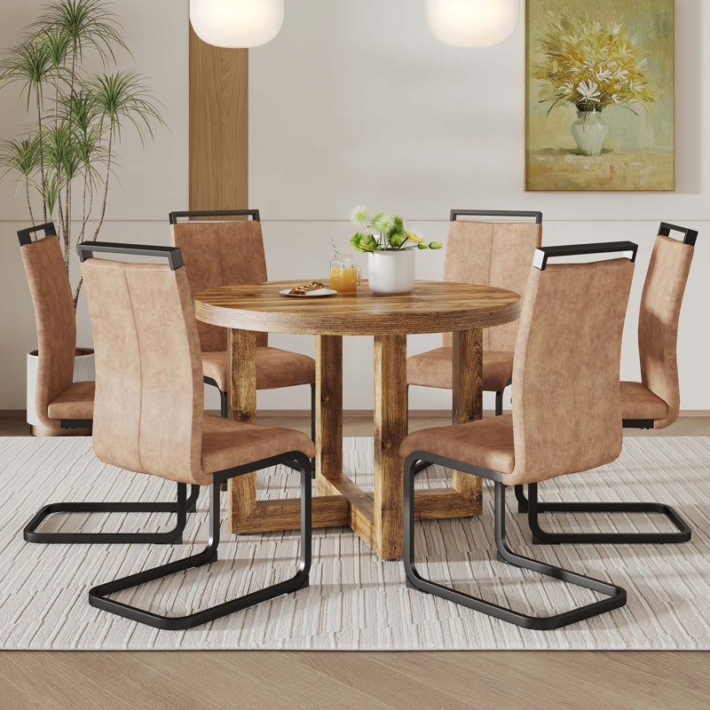 Chester Une table de salle à manger circulaire moderne et pratique. Chaise d'appoint en tissu 4 pièces 4 pièces, 7
