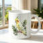 Charming Ceramic Mug with Yellow Cockatiel Bird on Green Branch Design - Ideal Gift for Bird Lover on Birthday Anniversary.