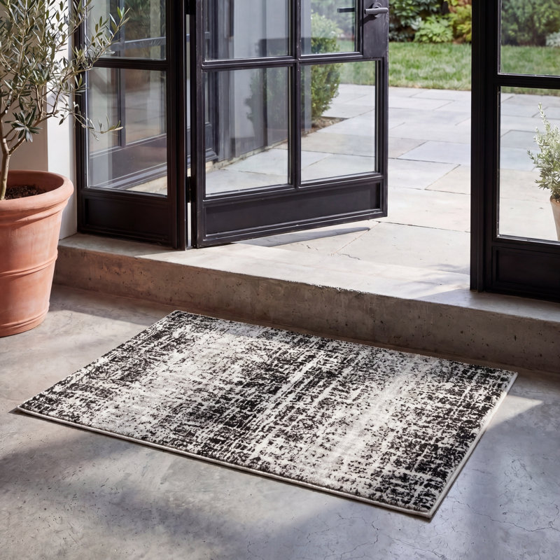 Tapis noir Riebe, Rectangle 2 pi 6 po x 4 pi