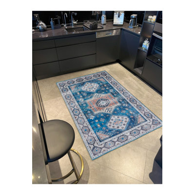 Tapis décoratif bleu lavable traditionnel