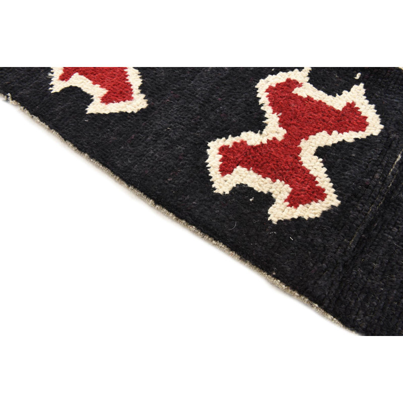 Tapis noir Iniguez