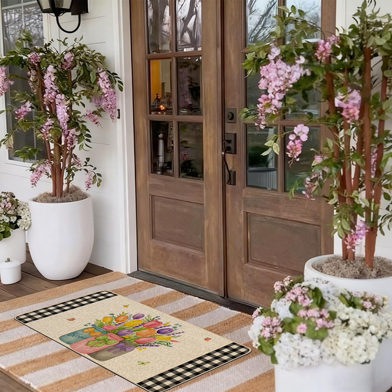 Tapis de printemps à motif floral noir avec motif de tulipes et de papillons