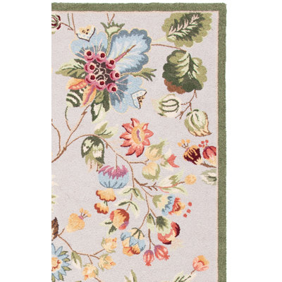 Tapis sauge en laine à motif floral Hollander