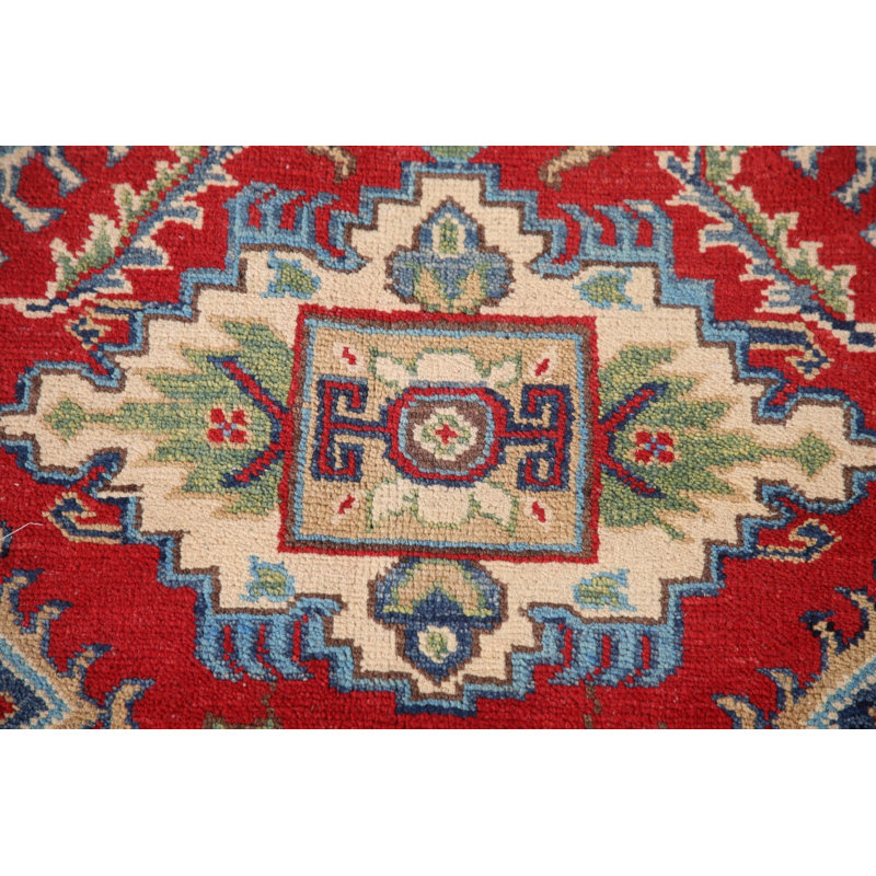Tapis rouge à motif oriental Kazak