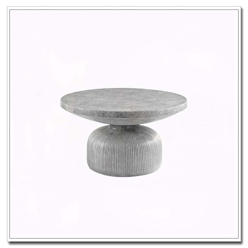 Table basse grise patinée avec plateau rond et base piédestal