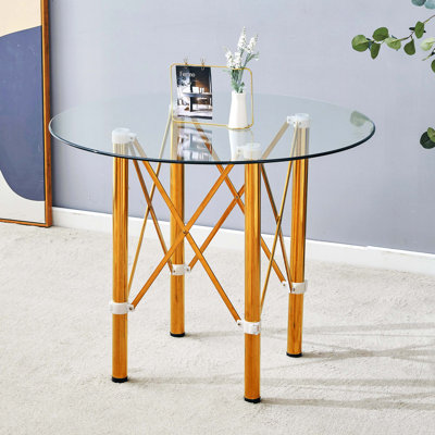 Élégante table de salle à manger ronde en verre trempé transparent de 36 po avec pieds en métal doré, conception télescopique avec raccordement à ventouse