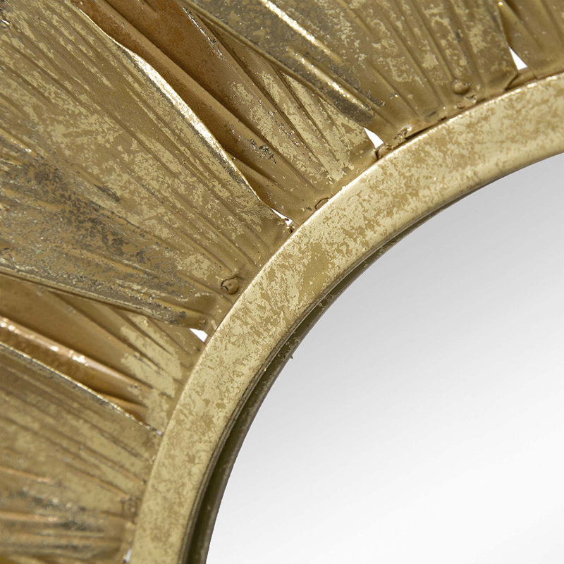 Miroir rond en métal doré