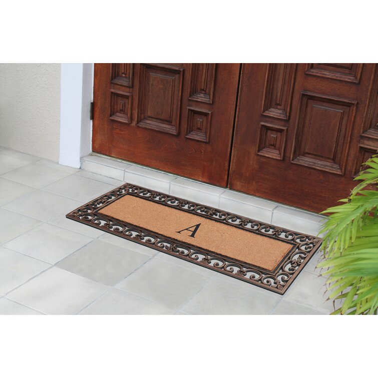 https://assets.wfcdn.com/im/71469817/resize-h755-w755%5Ecompr-r85/1447/144714117/Abaza+Natural+Coir+Monogrammed+Door+Mat+for+Front+Door%2C+18%22x48%22.jpg