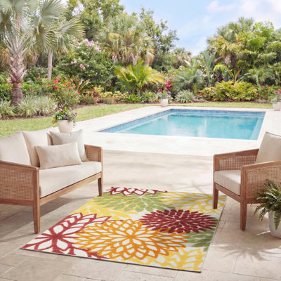 Tapis intérieur / extérieur jaune / rouge / vert à motif floral Geib