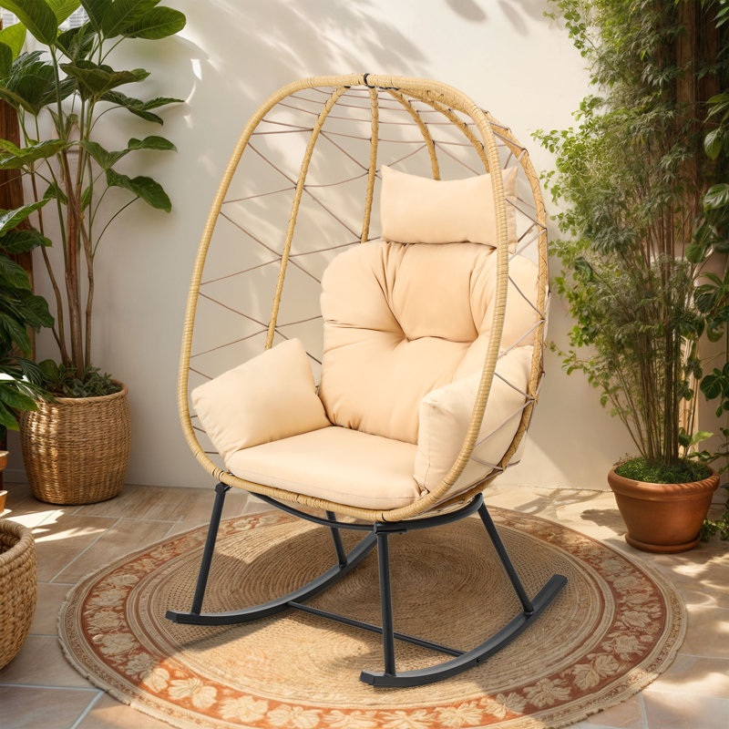 Tranquility Rocking Egg Chair with Weather-Resistant Rattan and Cozy Cushions