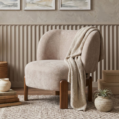 Fauteuil d'appoint à oreilles rembourré avec assise coussinée et pieds en bois massif