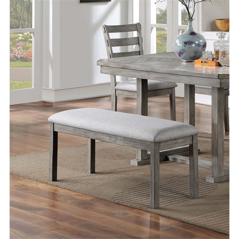 Banc de salle à manger rustique en bois massif avec siège rembourré en tissu et finition brossée, parfait pour un décor de maison de campagne moderne.