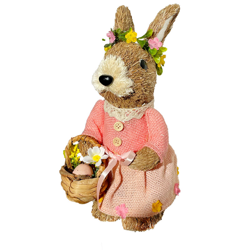 Figurine de lapin de Pâques avec panier de Pâques en paille