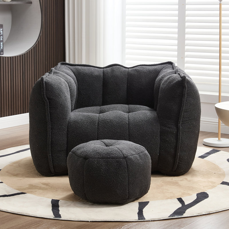 Fauteuil à billes avec repose-pieds Lazy, Chenille noir